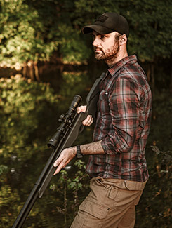 shooter holding the Umarex Origin at the ready